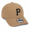 beige new era cap